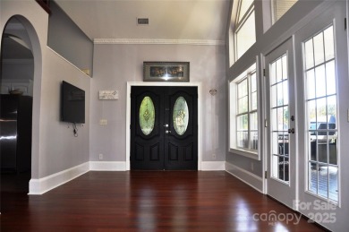 Great price improvement! This custom-built waterfront home on - photo 3