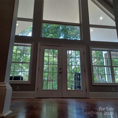 Great price improvement! This custom-built waterfront home on - photo 7