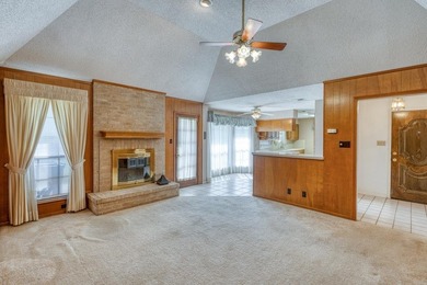 Opportunity awaits in this quaint brick home with a tile roof - photo 4