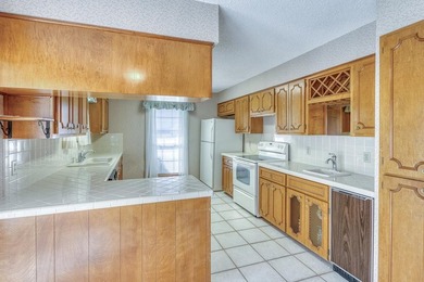 Opportunity awaits in this quaint brick home with a tile roof - photo 7