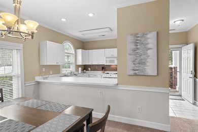 Welcome to 687 Riverwalk Dr, Unit 104, a coastal condo located - photo 12