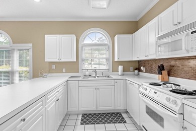 Welcome to 687 Riverwalk Dr, Unit 104, a coastal condo located - photo 13