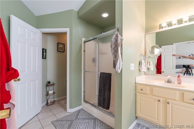 Walk-in, no steps, attached garage, lake views, and very low - photo 23