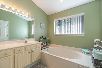 Walk-in, no steps, attached garage, lake views, and very low - photo 24