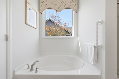 Welcome to this beautifully maintained single-level home in the