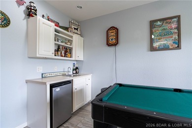 Walk-in, no steps, attached garage, lake views, and very low - photo 27