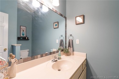 Walk-in, no steps, attached garage, lake views, and very low - photo 30