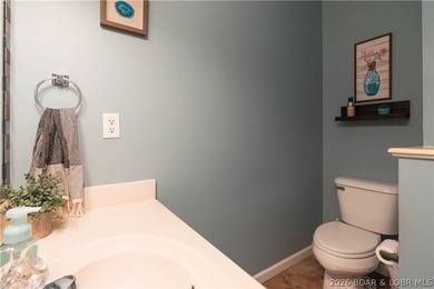 Walk-in, no steps, attached garage, lake views, and very low - photo 31