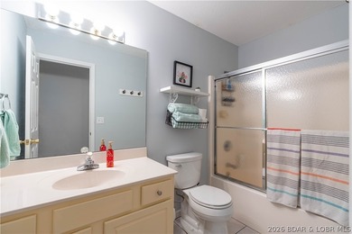Walk-in, no steps, attached garage, lake views, and very low - photo 36