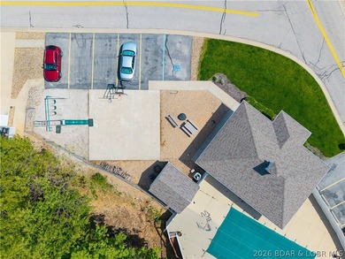 Walk-in, no steps, attached garage, lake views, and very low - photo 49