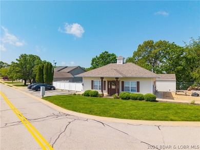 Walk-in, no steps, attached garage, lake views, and very low - photo 50