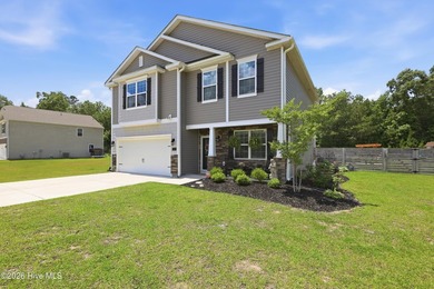 Welcome to 116 Featherstone Lane. This almost new home is close - photo 2