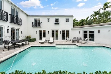 This luxurious Miami Beach estate presents a seamless blend of - photo 2