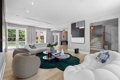 This luxurious Miami Beach estate presents a seamless blend of - photo 3