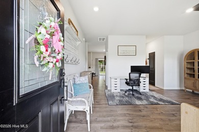 Welcome to 116 Featherstone Lane. This almost new home is close - photo 4