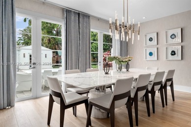 This luxurious Miami Beach estate presents a seamless blend of - photo 6