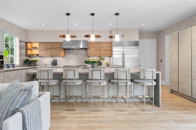 This luxurious Miami Beach estate presents a seamless blend of - photo 7