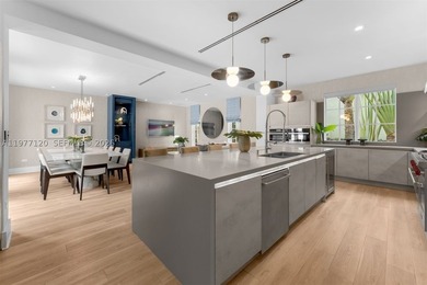 This luxurious Miami Beach estate presents a seamless blend of - photo 10
