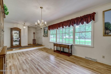 Nestled on a beautifully landscaped triple lot, this - photo 5