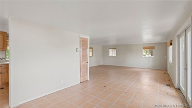 Fix-and-Flip Opportunity with Incredible Lakefront Views This - photo 13