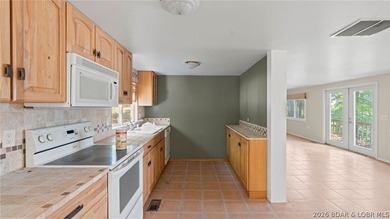 Fix-and-Flip Opportunity with Incredible Lakefront Views This - photo 19