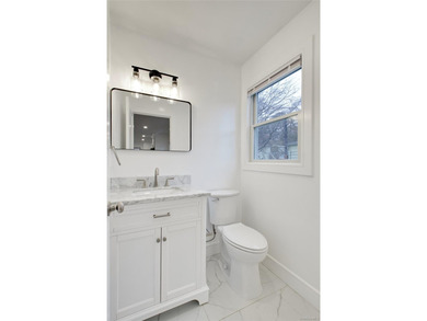 Lovely 2 family new construction almost completed. Truly a - photo 31