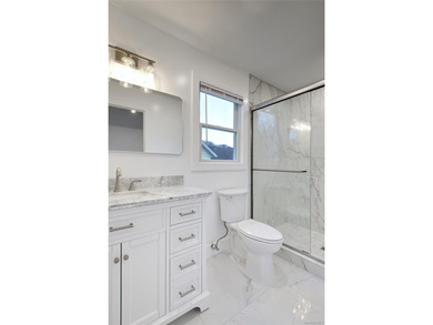 Lovely 2 family new construction almost completed. Truly a - photo 32