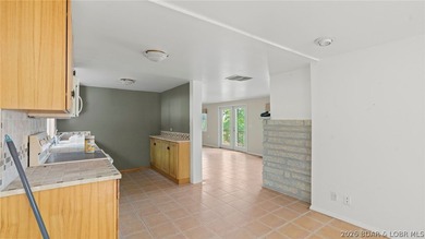 Investor Special with Lakefront & Development Potential! These - photo 13