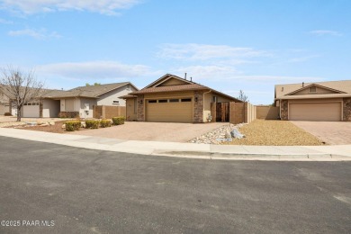 Welcome to this beautifully maintained 2,002 sq ft home nestled