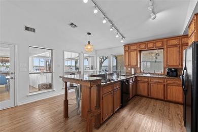 Positioned on open water, this lakefront home delivers a rare - photo 12