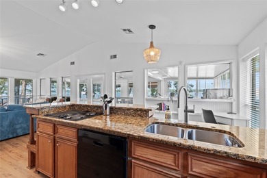 Positioned on open water, this lakefront home delivers a rare - photo 13