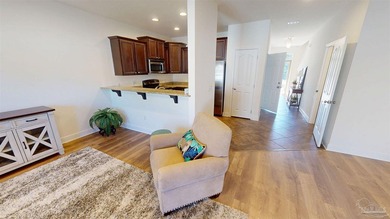 Welcome home to this all-brick townhome that checks all the - photo 3
