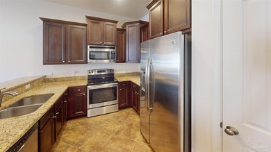 Welcome home to this all-brick townhome that checks all the - photo 4