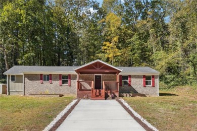 Lake Home For Sale in Cumming, Georgia