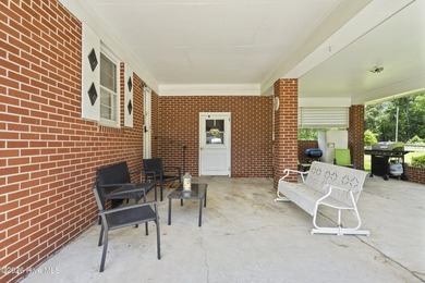 Charming, well-maintained brick home situated on a rare .79-acre - photo 5
