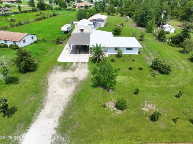Deer Point Lake Home For Sale in Youngstown Florida