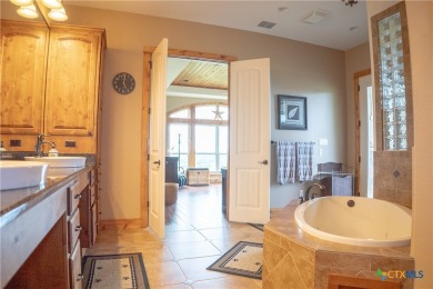 Stunning custom home on gorgeous 35.04 acres (per plat) within