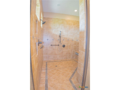 Stunning custom home on gorgeous 35.04 acres (per plat) within