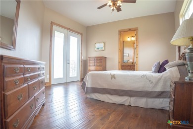 Stunning custom home on gorgeous 35.04 acres (per plat) within