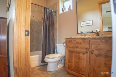 Stunning custom home on gorgeous 35.04 acres (per plat) within