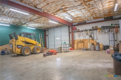 Stunning custom home on gorgeous 35.04 acres (per plat) within