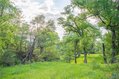 Stunning custom home on gorgeous 35.04 acres (per plat) within