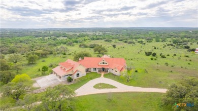 Stunning custom home on gorgeous 35.04 acres (per plat) within