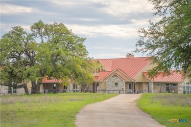 Stunning custom home on gorgeous 35.04 acres (per plat) within