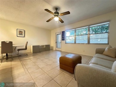 Lake Condo For Sale in Deerfield Beach, Florida