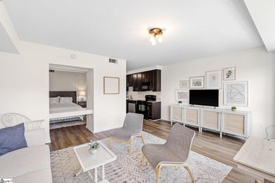 Enjoy all the conveniences of downtown Greenville living in this