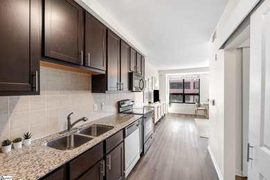 Enjoy all the conveniences of downtown Greenville living in this