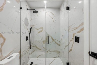 Walk to the beach from this stunning designer-renovated Miami - photo 21