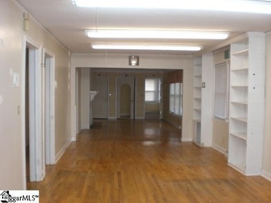 Desirable location just off Wade Hampton Boulevard suitable for