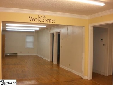 Desirable location just off Wade Hampton Boulevard suitable for